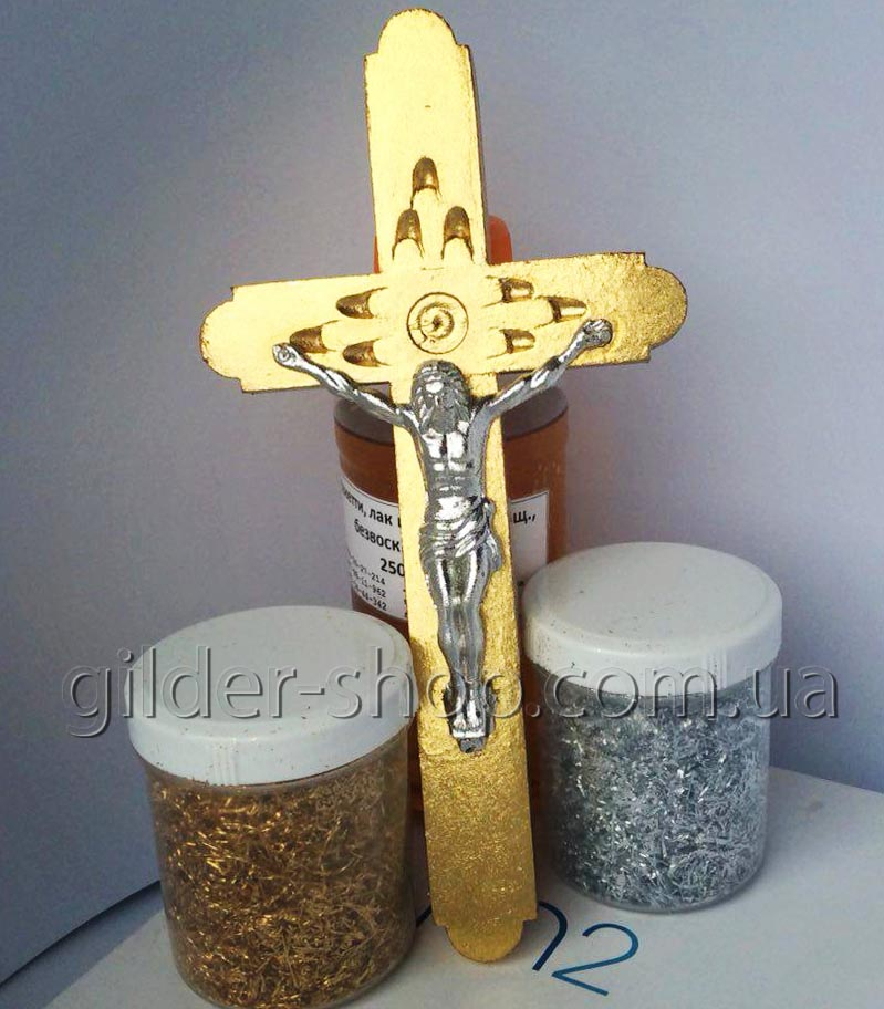 Позолота крестика золотой и серебряной ватой для золочения
